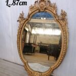 17DG13 -Beautiful French mirror in stuccoed and gilded wood with Louis XV decoration of flowers, shells and acanthus leaves  Circa: 1880  In an very good condition.