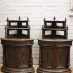 23DG47 A Pair of Oak Renaissance Corner cabinets